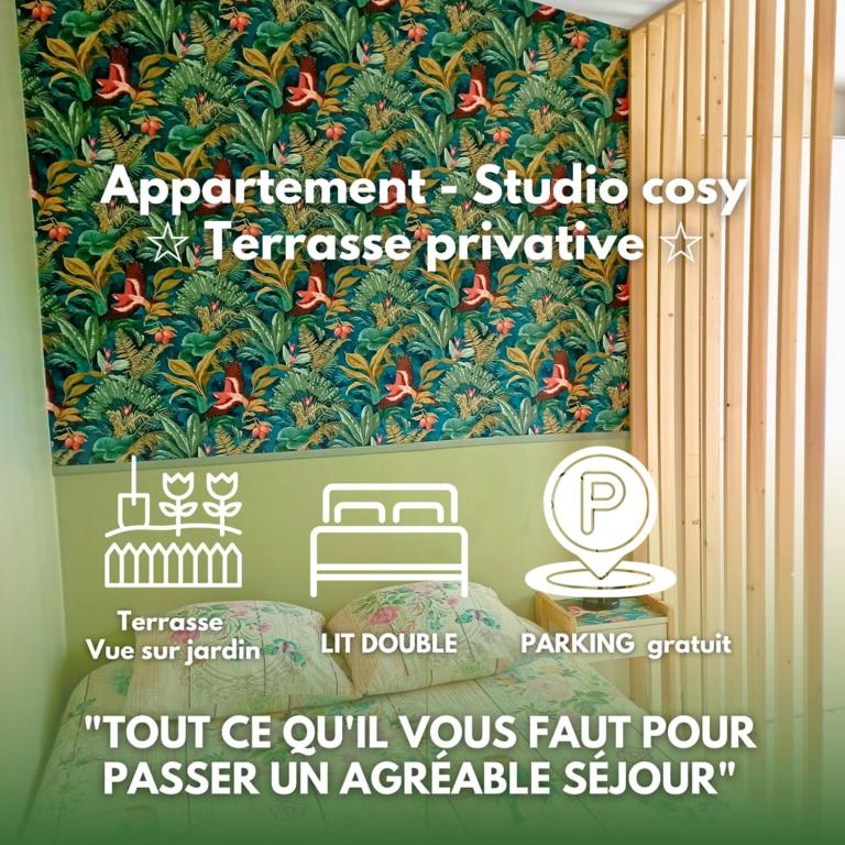 a sign in a room with a picture of a painting at Studio confortable au calme - Terrasse privative in Labergement-Foigney