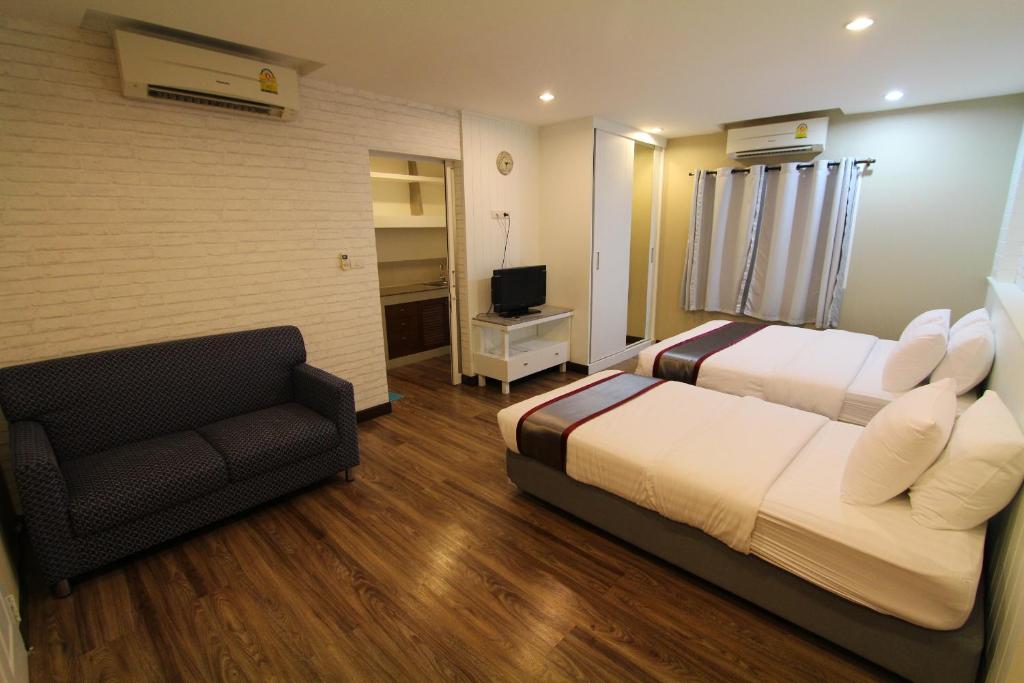 TV a/nebo společenská místnost v ubytování At Residence Suvarnabhumi Hotel