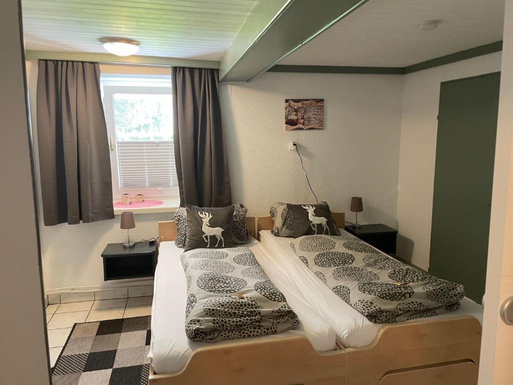 a bedroom with a bed and a window at Apartment Appartement Wasserfall by Interhome in Stall