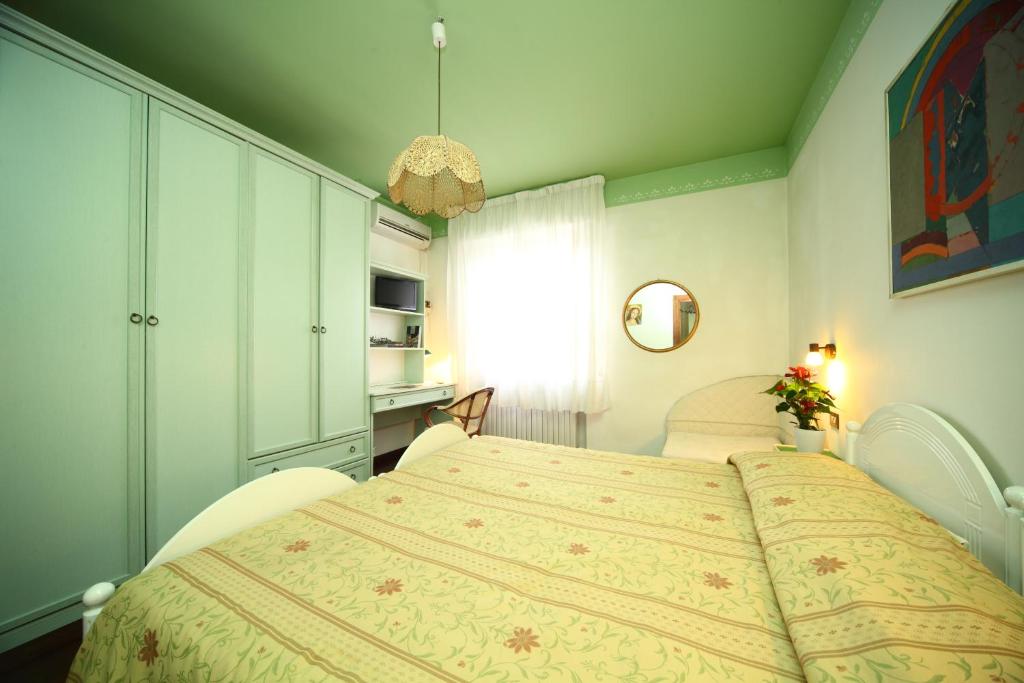 Postel nebo postele na pokoji v ubytování B&B Francesco in Assisi