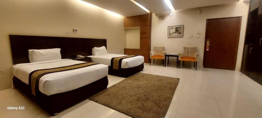 The Avenue Hotel & Suites photo