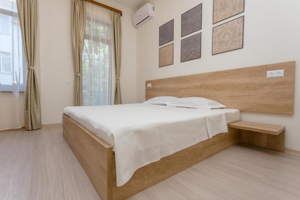 Postel nebo postele na pokoji v ubytování Mais Guest House