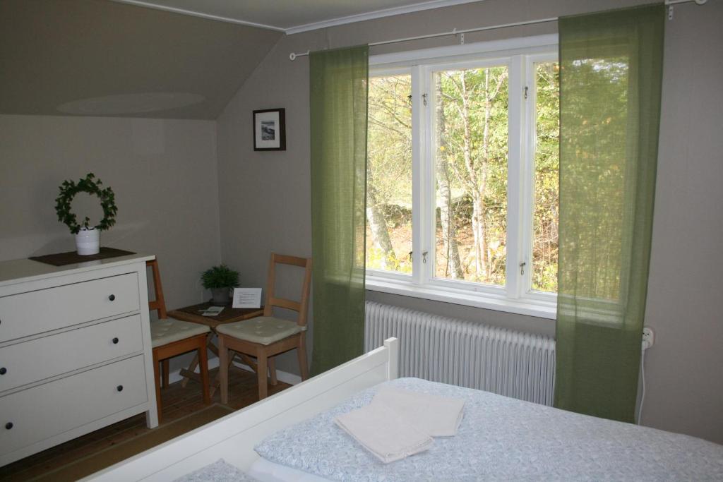 Postel nebo postele na pokoji v ubytování Hotel & Pensionat Björkelund
