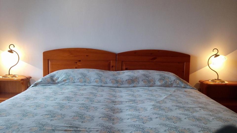Postel nebo postele na pokoji v ubytování Agriturismo Zì Carmine
