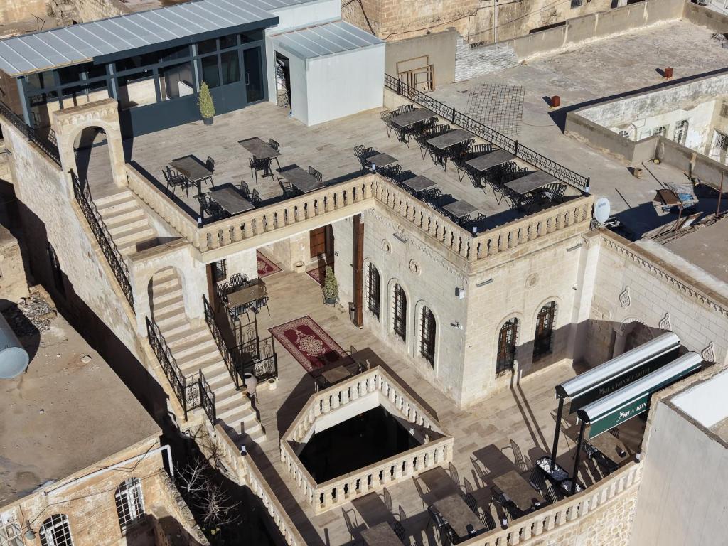 an overhead view of an old building with stairs at Sıla Konağı Hotel in Mardin