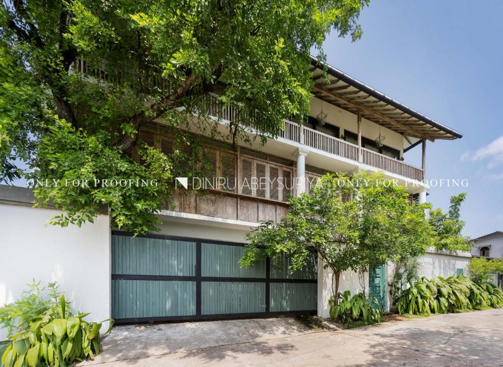 an image of a building with a garage at Casa18Villa in Kiribathgoda