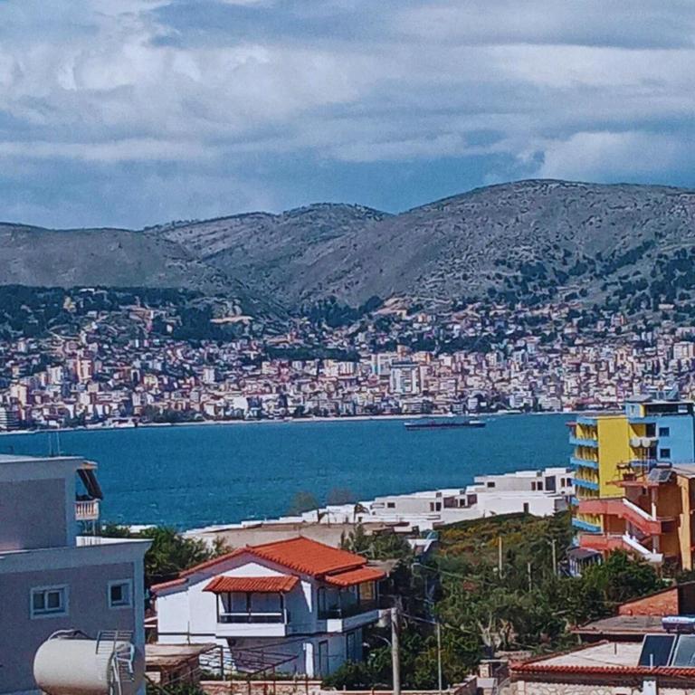 a view of a city and a body of water at Apartments Polonia Saranda in Sarandë