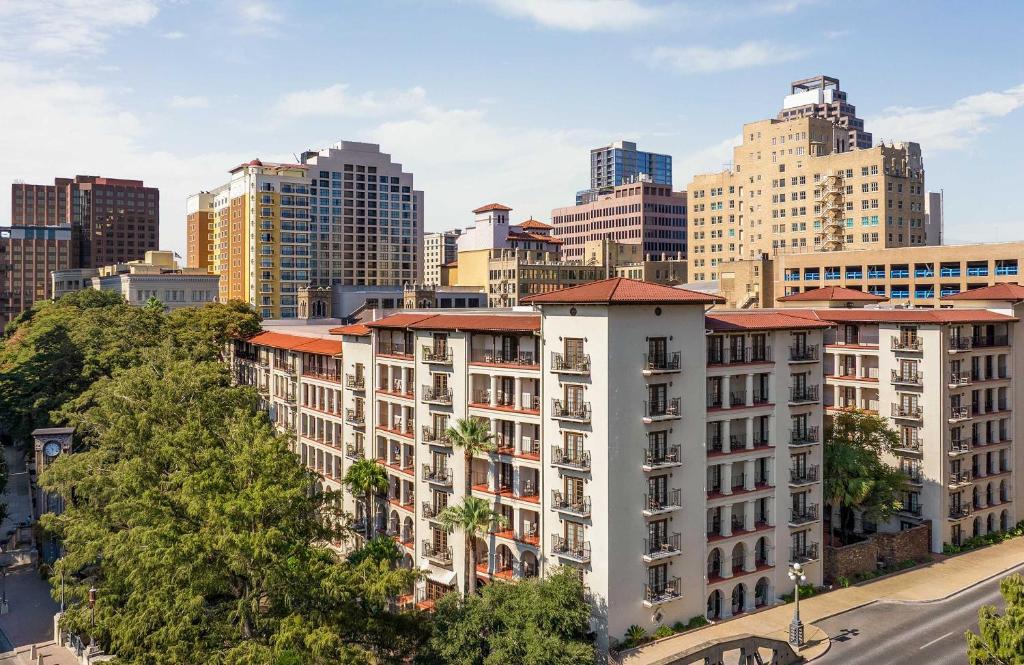 a view of a city with tall buildings at Omni La Mansion del Rio in San Antonio