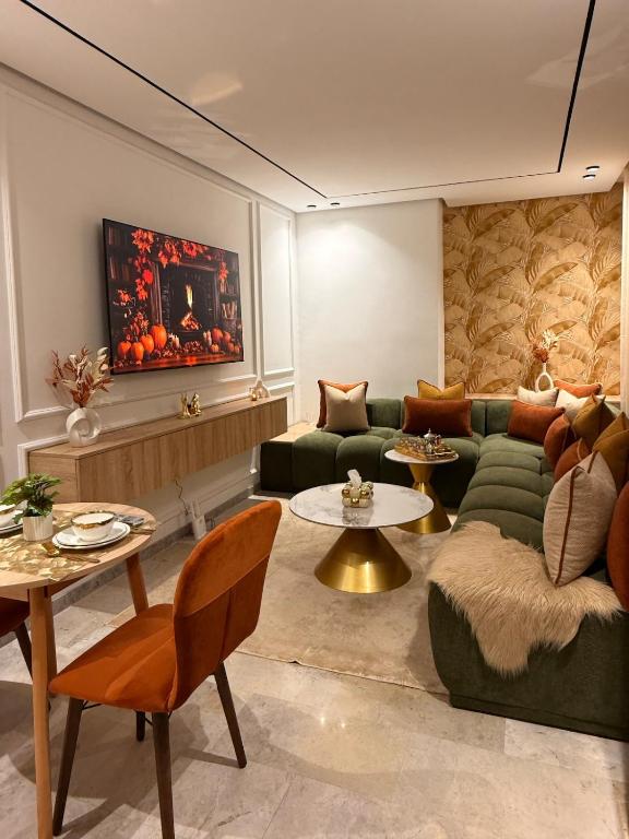 a living room with a couch and a table at Luxury Studio Casa Center in Casablanca