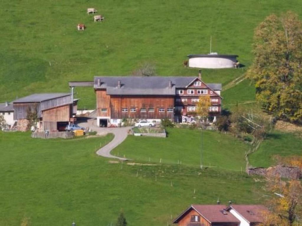 an aerial view of a large barn in a field at Apartment Hasenbüel by Interhome in Ricken