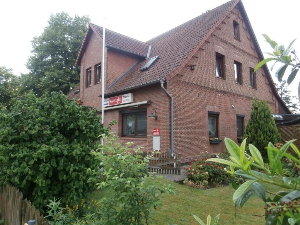 a brick house with a fence in front of it at Apartment Gill by Interhome in Stelle