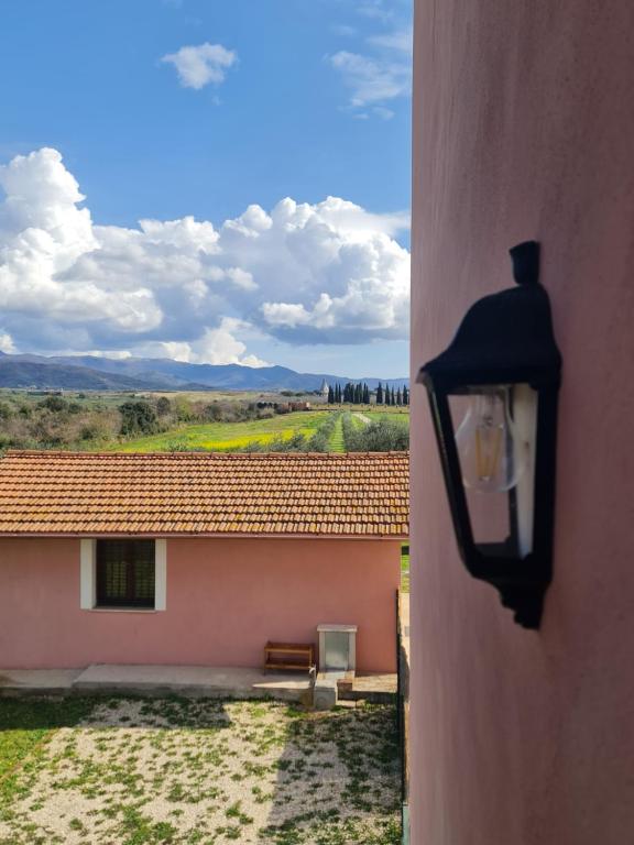 a light on the side of a building with a view at Agriturismo San Germano in San Vittorino