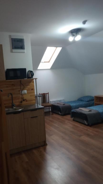 Llit o llits en una habitació de Chmurka
