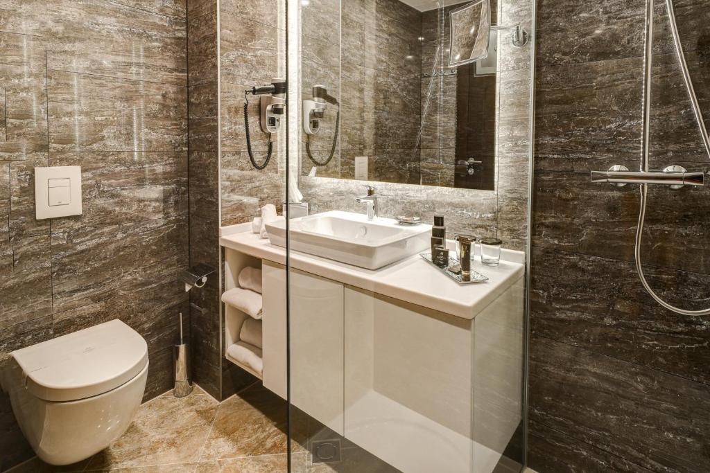 Koupelna v ubytování Malak Regency Hotel