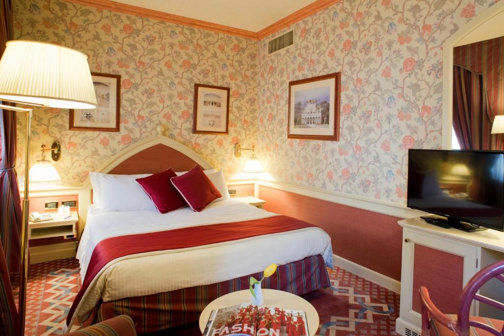 
Cama o camas de una habitación en iH Hotels Milano Regency
