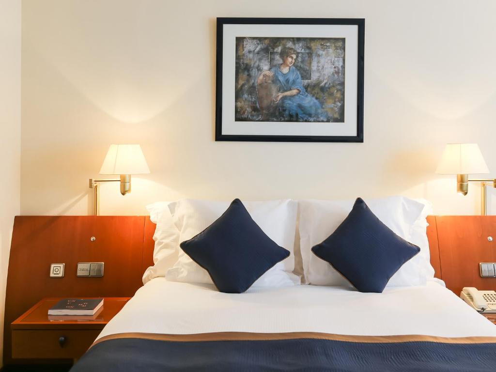 Postel nebo postele na pokoji v ubytování Le Royal Hotels & Resorts Luxembourg