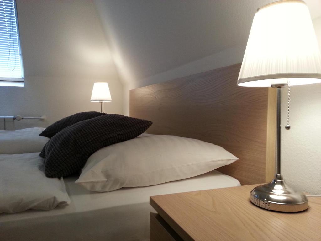 Postel nebo postele na pokoji v ubytování Retro Hotel Villa Ostrava