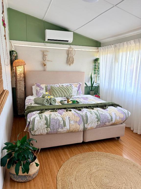 a bedroom with a bed in a room with at Mystic Garden Private Entry & Bath, Pet Friendly in Wentworthville