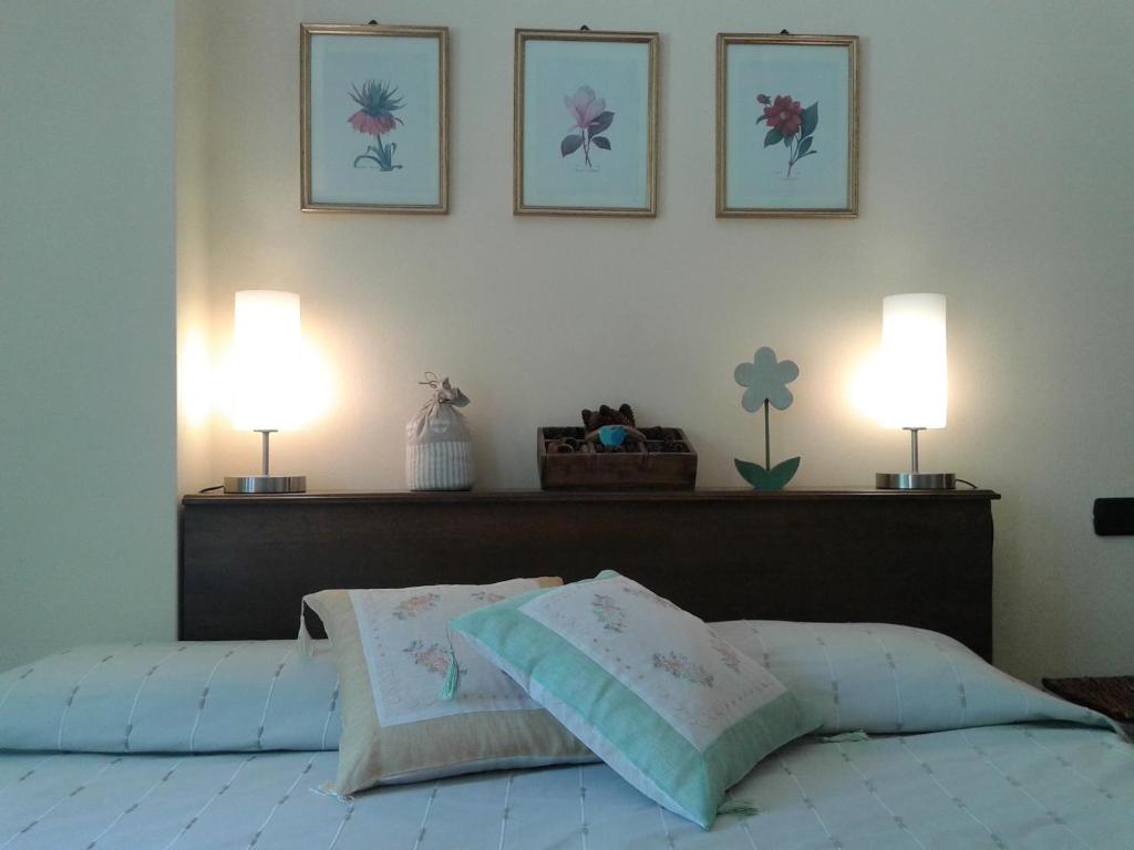 Postel nebo postele na pokoji v ubytování B&B Il Picchio