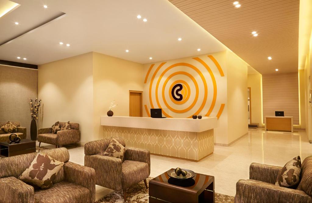 Posezení v ubytování Click Hotel, Junagadh