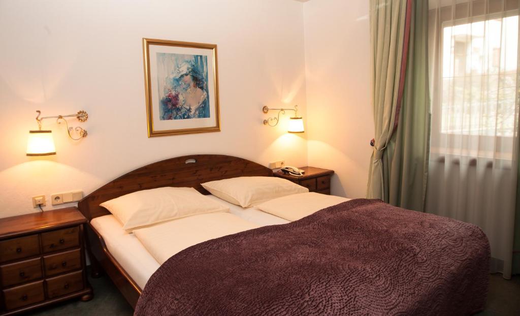 Letto o letti in una camera di Das Landhaus Apartments Prägant