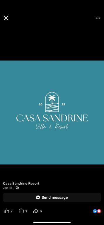 a computer screen with a logo on it at Casa Sandrine Resort in Malolos
