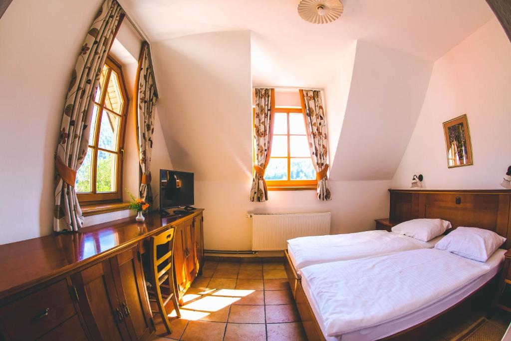 Postel nebo postele na pokoji v ubytování Hotel Kovac
