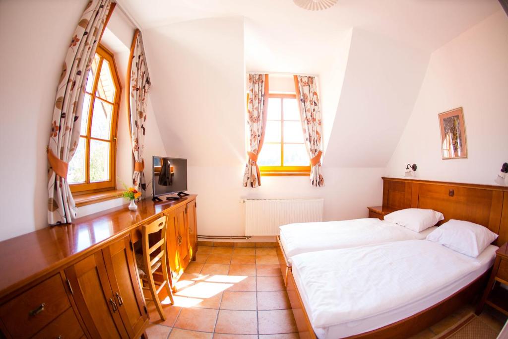 Postel nebo postele na pokoji v ubytování Hotel Kovac