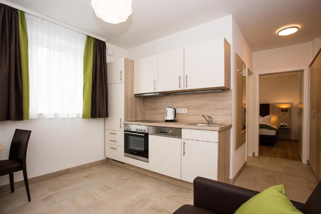 Kuchyň nebo kuchyňský kout v ubytování Gästehaus Turmblick