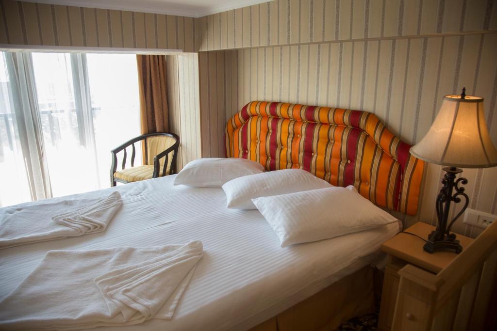 Postel nebo postele na pokoji v ubytování Shirak Hotel