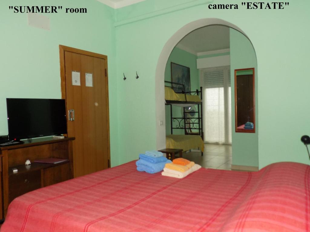 Postel nebo postele na pokoji v ubytování B&B Falcone