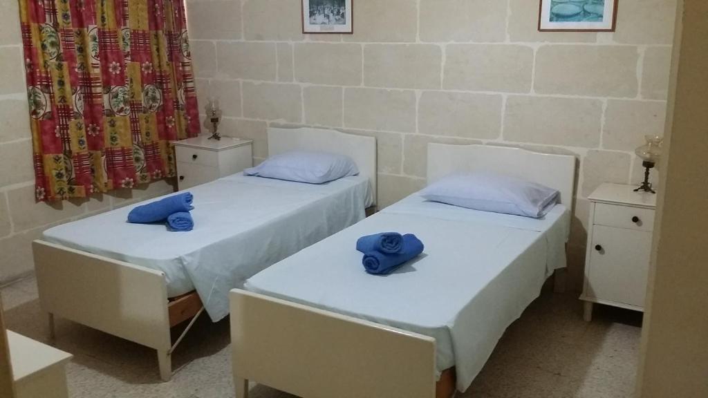 Postel nebo postele na pokoji v ubytování Maryanne-Joe Flats