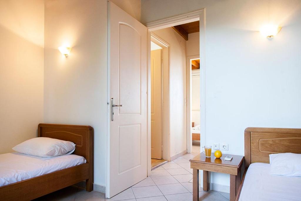 Postel nebo postele na pokoji v ubytování Villaaltinaapartments