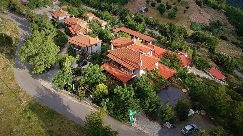 an overhead view of a large house with orange roofs at Koustenis Village in Dimitsana