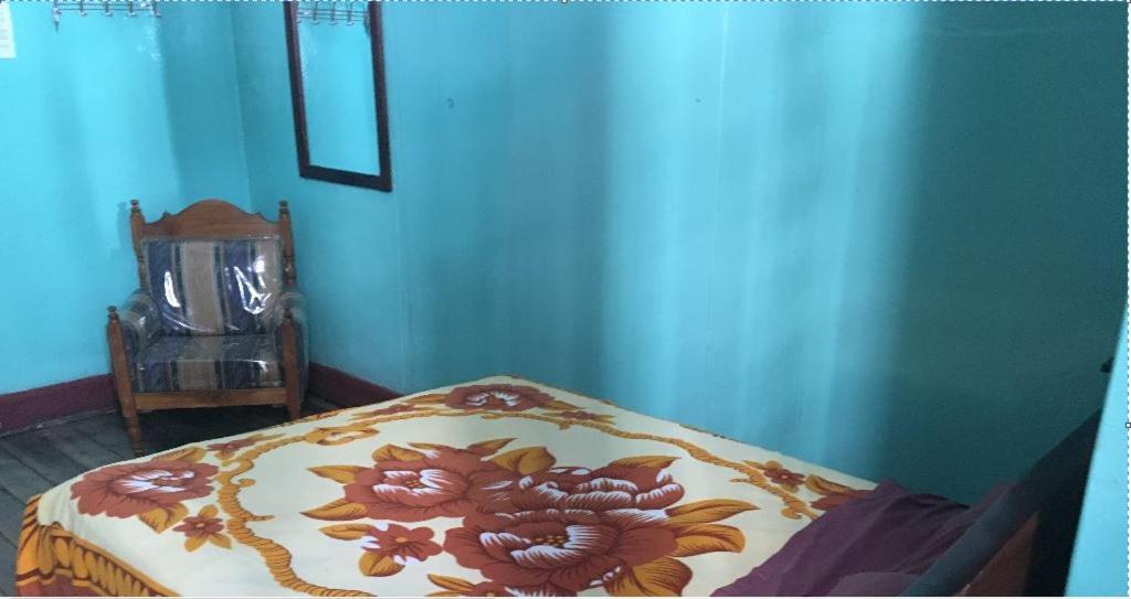Postel nebo postele na pokoji v ubytování Hostal La Chorrera