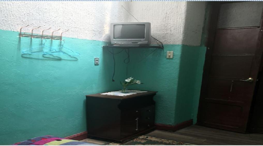 TV a/nebo společenská místnost v ubytování Hostal La Chorrera