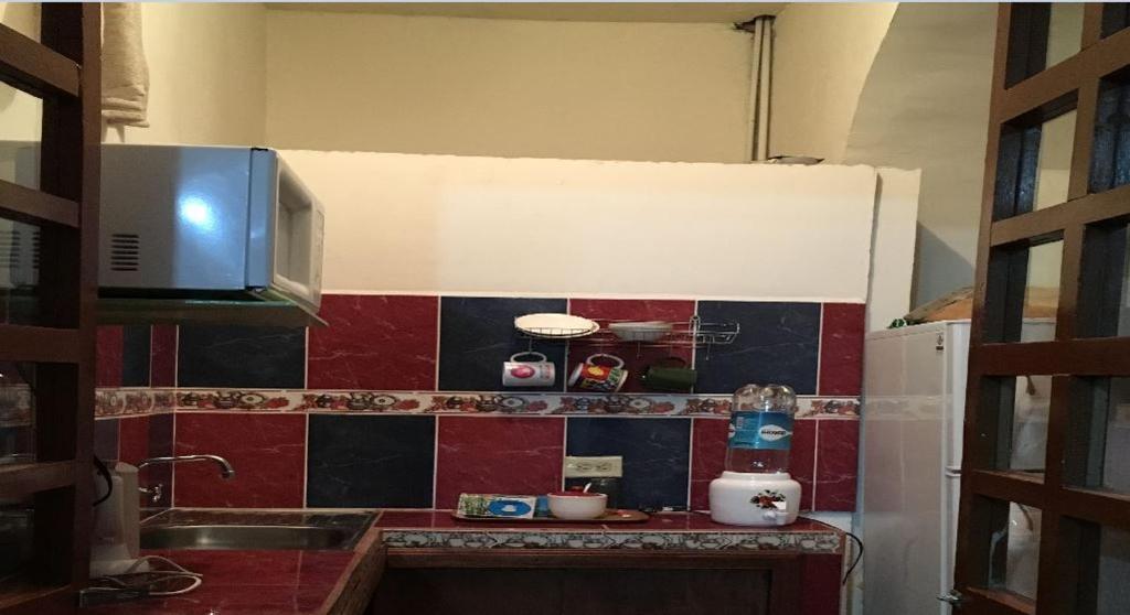 Kuchyň nebo kuchyňský kout v ubytování Hostal La Chorrera