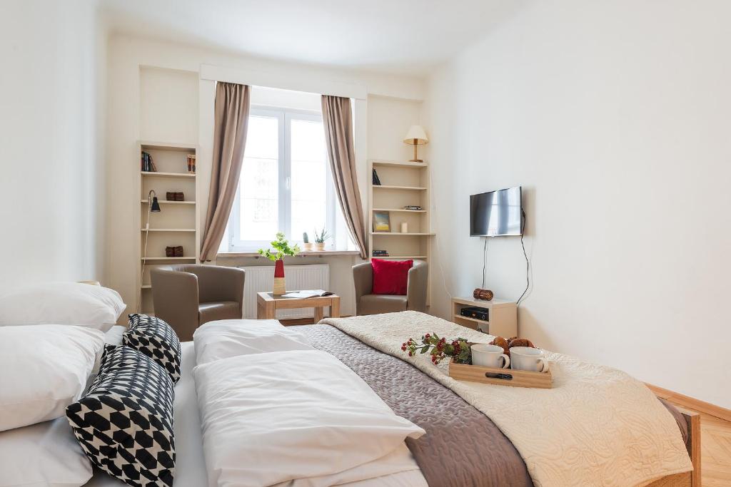 Posteľ alebo postele v izbe v ubytovaní P&O Apartments Old Town