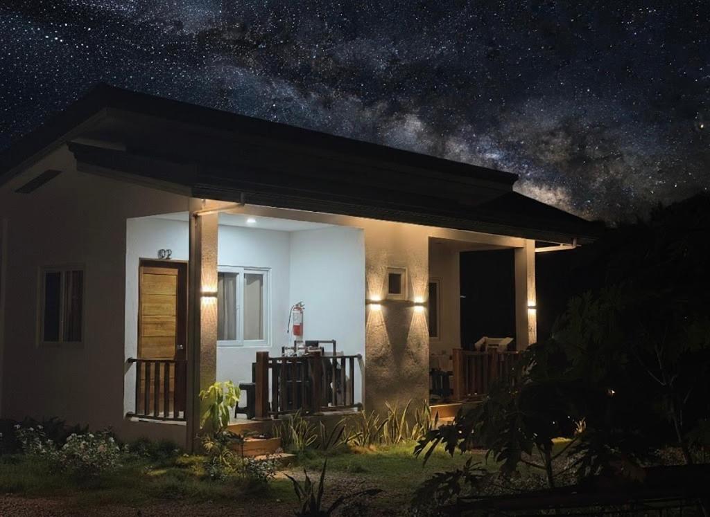 a small house at night with a starry sky at Salamya Guesthouse in San Juan