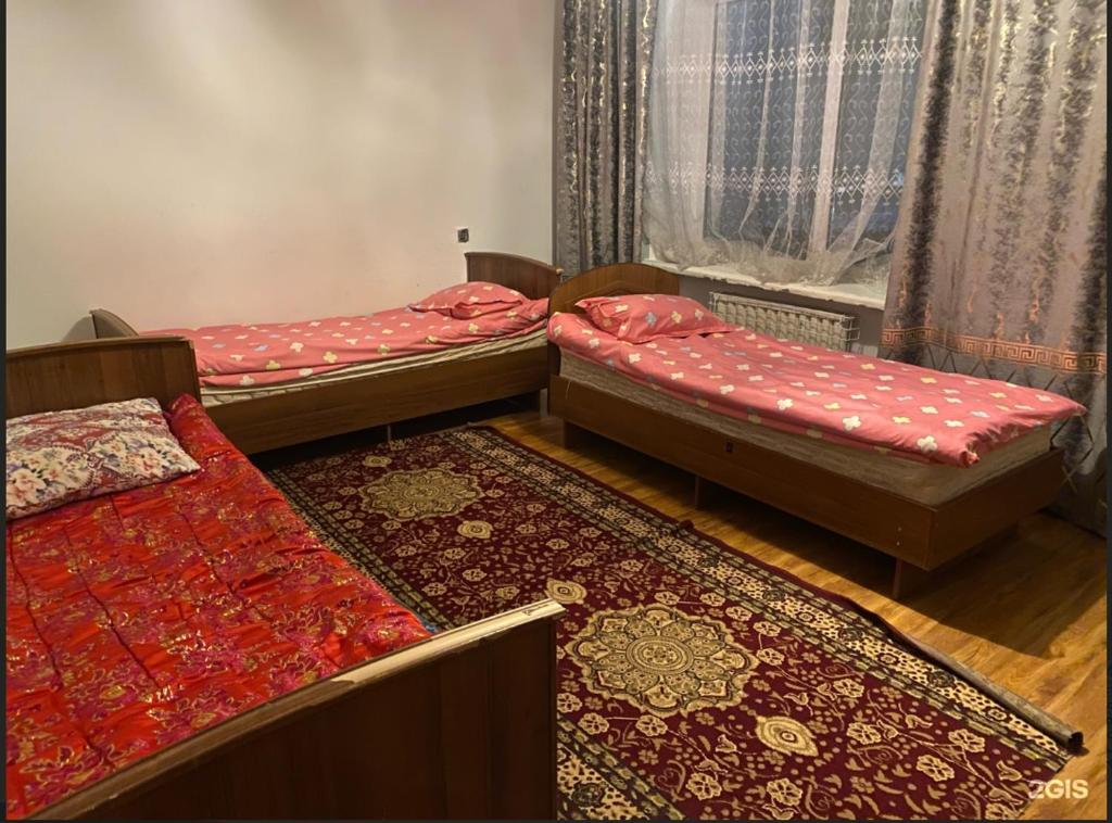 Postel nebo postele na pokoji v ubytování Ала-Тоо