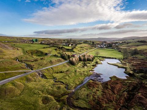 an aerial view of a river in a field at Quarrymen's Arms in Nant-y-bwch