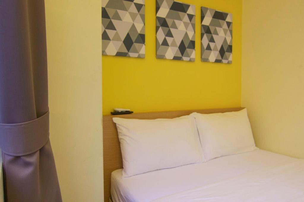 Postel nebo postele na pokoji v ubytování Hotel 1000 Miles