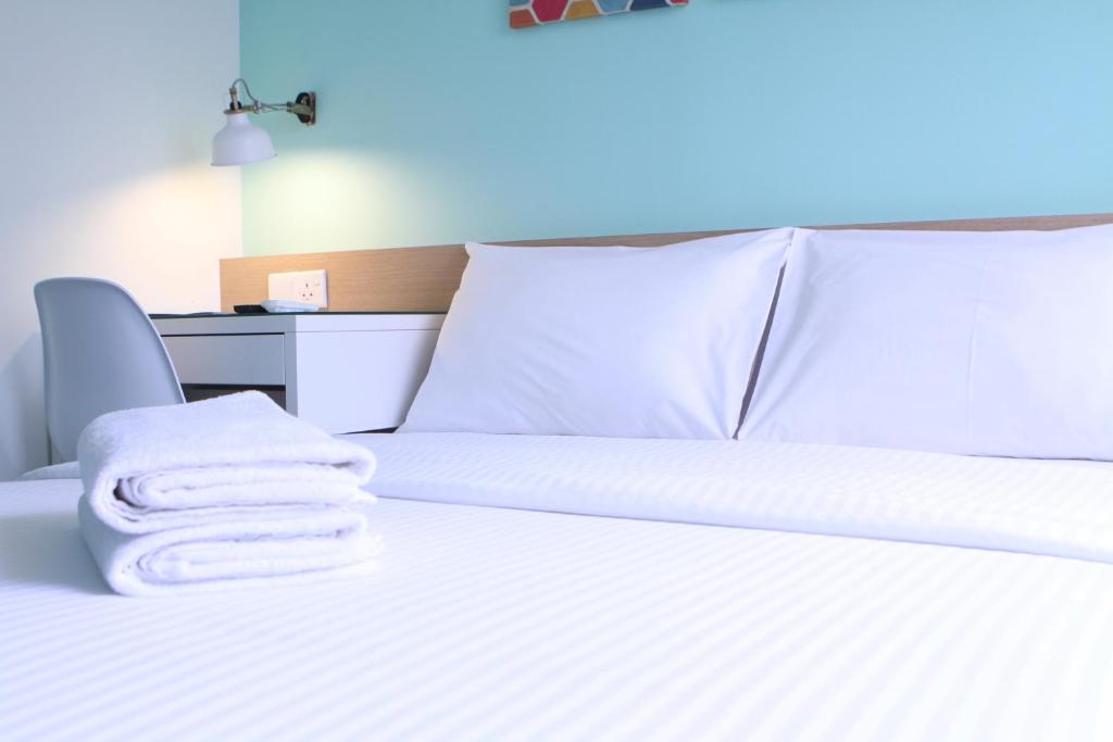 Postel nebo postele na pokoji v ubytování Hotel 1000 Miles