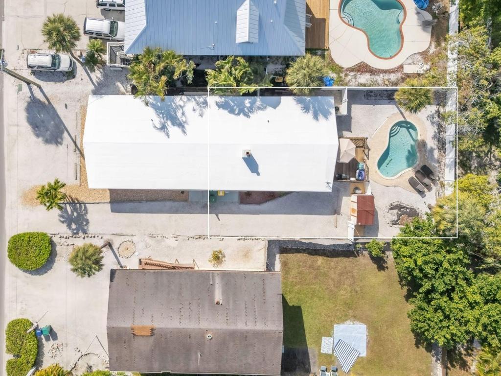 an overhead view of a house with a white billboard at Island Gem B home in Anna Maria