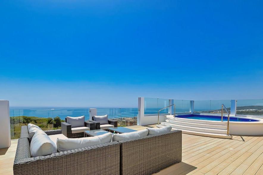 a view of a house with a swimming pool at NEW Duplex Penthouse, Spectacular Ocean View in Manilva