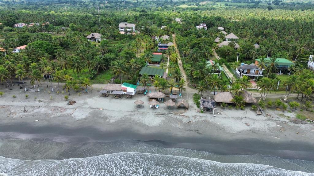an aerial view of the beach at a resort at PalMar Ecolodge in Moñitos
