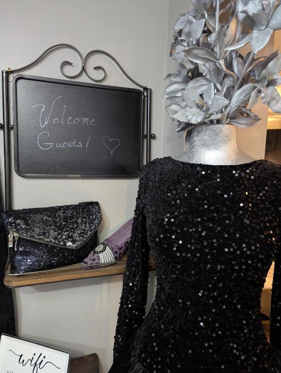 a dress on a mannequin in front of a chalkboard at The Hillside Hottie! in Corydon