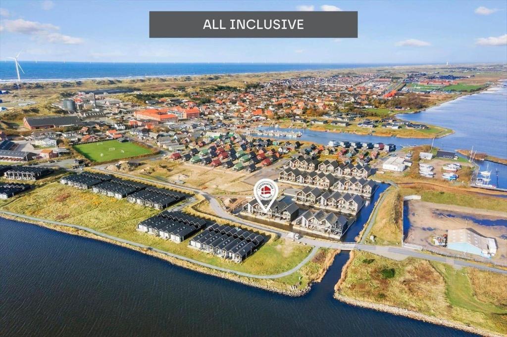 an aerial view of an island in the water at 9928-Hvide-Sande-Langsand-86 in Hvide Sande