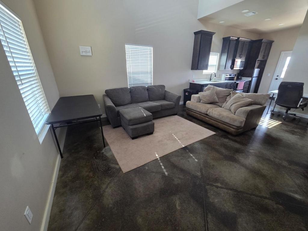 a living room with a couch and a table at Special Deal on Booking Unit-558 in Paris