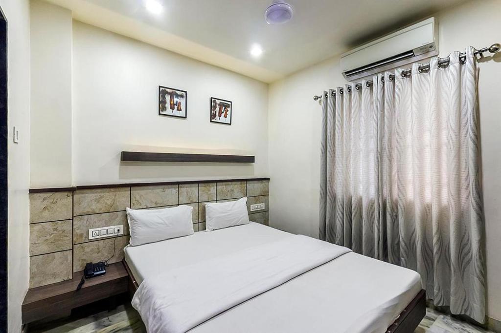 Postel nebo postele na pokoji v ubytování Hotel City Inn